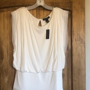 White House Black Market White sleeveless top.